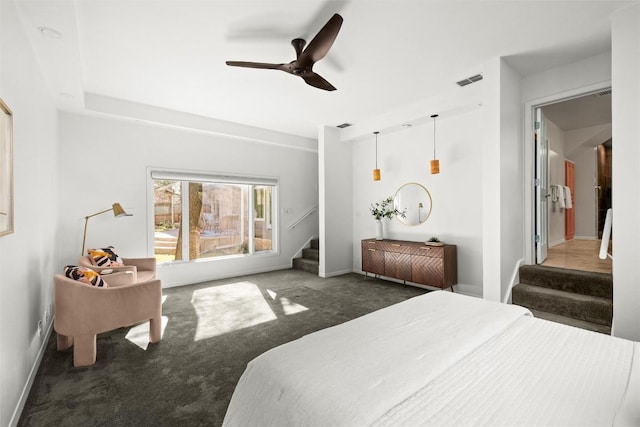 bedroom with carpet, visible vents, ceiling fan, and baseboards