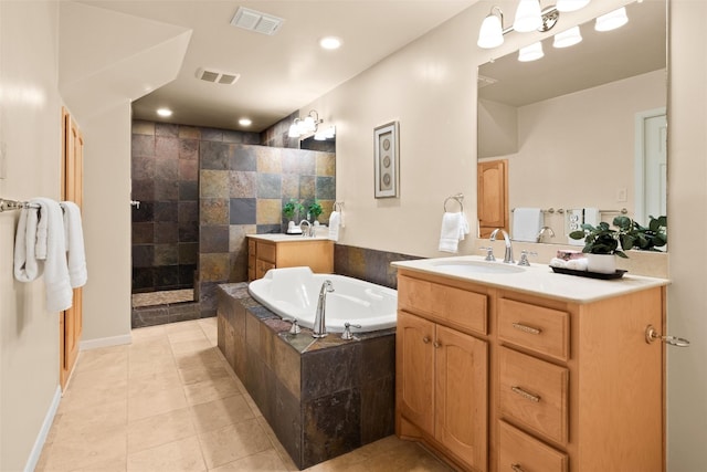 full bathroom with tile patterned flooring, visible vents, vanity, and a bath