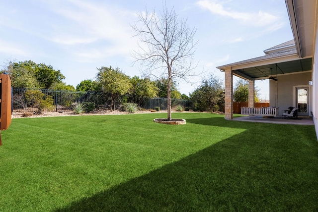 view of yard with a fenced backyard and a patio