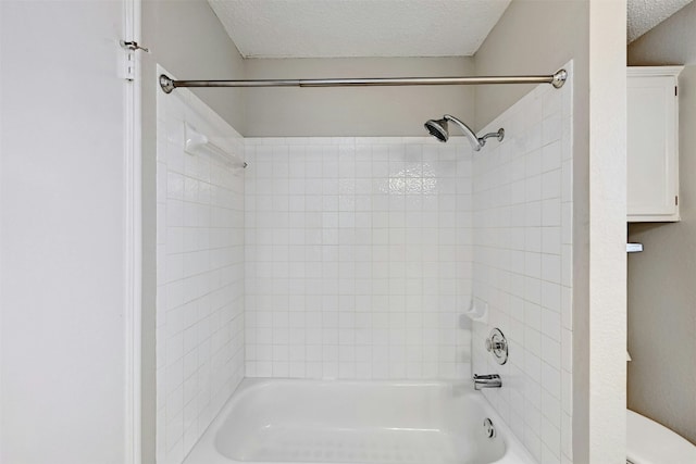 1807 Hollow Tree Blvd, Round Rock, TX 78681 - bathroom featuring shower / tub combination and a textured ceiling