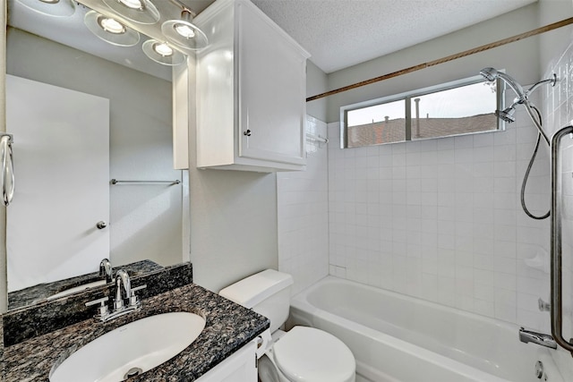 1807 Hollow Tree Blvd, Round Rock, TX 78681 - full bathroom featuring  shower combination, vanity, and a textured ceiling