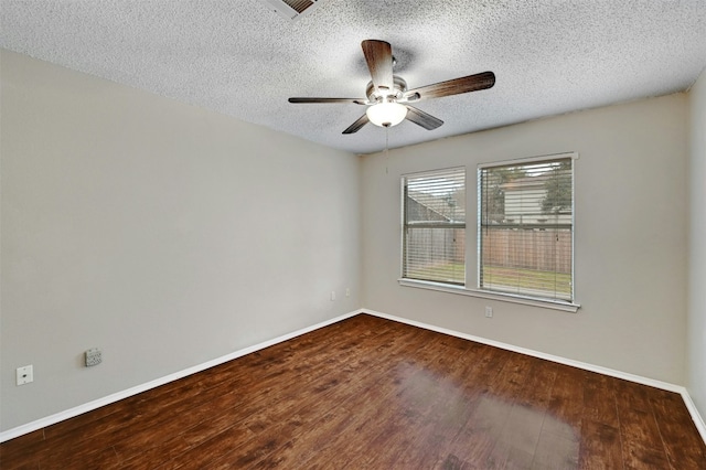 1807 Hollow Tree Blvd, Round Rock, TX 78681 - unfurnished room with a textured ceiling, wood finished floors, and ceiling fan