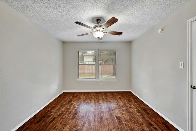 1807 Hollow Tree Blvd, Round Rock, TX 78681 - empty room featuring a ceiling fan, wood finished floors, a textured ceiling, and a smoke detector