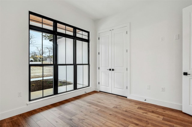360 Judy Dr, Dripping Springs, TX 78620 - interior space with baseboards and light wood finished floors