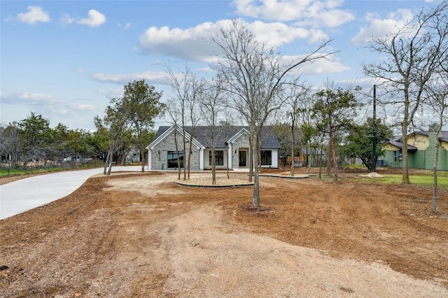 360 Judy Dr, Dripping Springs, TX 78620 - view of front of house with stone siding