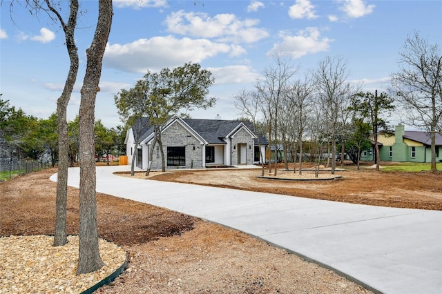 360 Judy Dr, Dripping Springs, TX 78620 - modern inspired farmhouse featuring stone siding