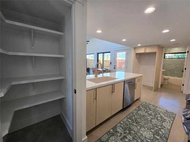 5305 Grover Ave Unit 2, Austin, TX 78756 - kitchen featuring dishwasher, light countertops, recessed lighting, and a peninsula