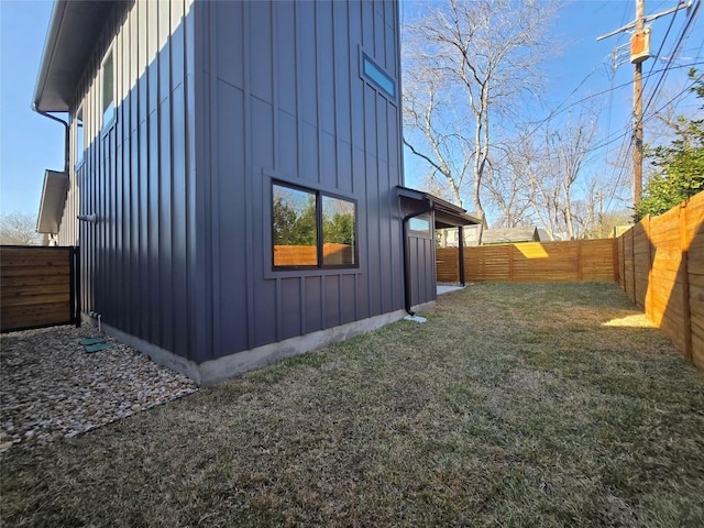 5305 Grover Ave Unit 2, Austin, TX 78756 - view of property exterior featuring board and batten siding and a fenced backyard