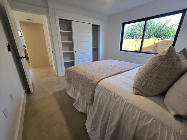 5305 Grover Ave Unit 2, Austin, TX 78756 - bedroom featuring finished concrete flooring and a closet