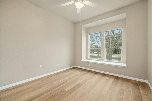 122 Durango Trl, Georgetown, TX 78633 - empty room with baseboards, light wood-type flooring, and ceiling fan
