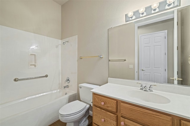 full bath featuring tub / shower combination, vanity, and toilet