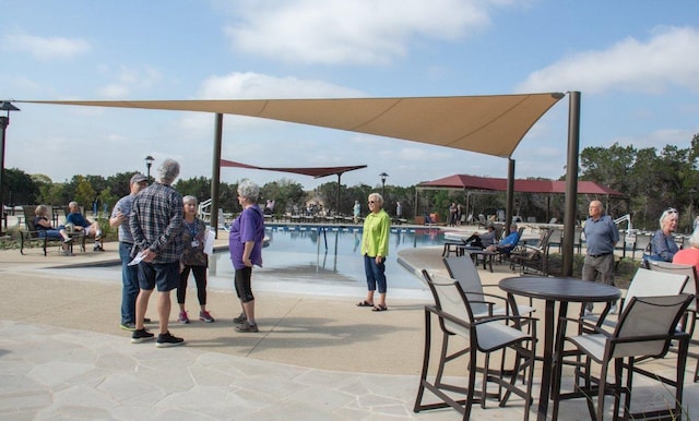 122 Durango Trl, Georgetown, TX 78633 - surrounding community featuring a pool and a patio area