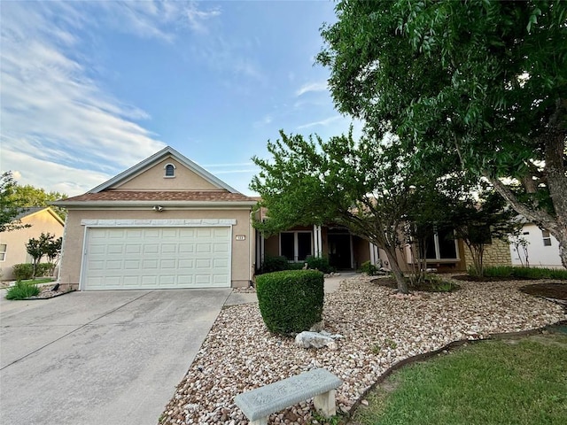 122 Durango Trl, Georgetown, TX 78633 - ranch-style house with concrete driveway, stucco siding, and a garage