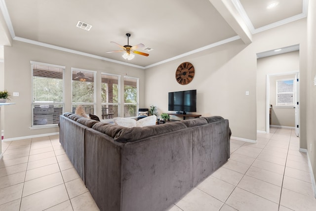 430 Archstone Loop, Belton, TX 76513 - living area featuring light tile patterned floors, a ceiling fan, crown molding, and baseboards