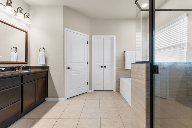 430 Archstone Loop, Belton, TX 76513 - bathroom with vanity, a bath, and tile patterned flooring