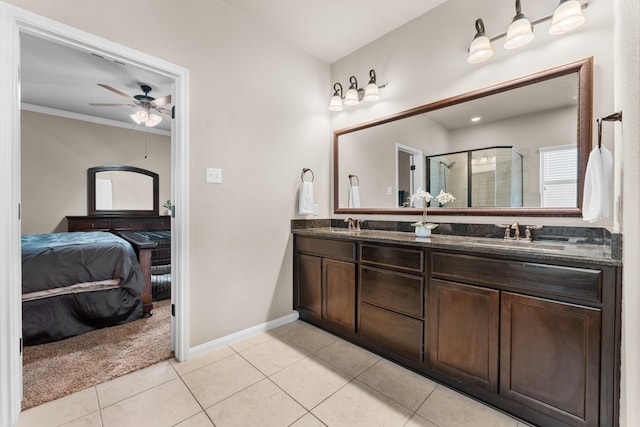 430 Archstone Loop, Belton, TX 76513 - ensuite bathroom featuring tile patterned flooring, a shower stall, a ceiling fan, double vanity, and baseboards