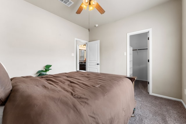 430 Archstone Loop, Belton, TX 76513 - bedroom featuring carpet floors, baseboards, a walk in closet, and a ceiling fan