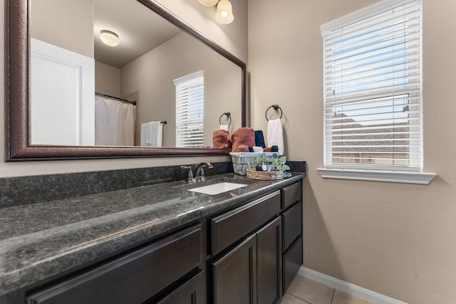 430 Archstone Loop, Belton, TX 76513 - bathroom with tile patterned flooring, vanity, and baseboards