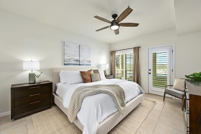 bedroom with access to outside, ceiling fan, baseboards, and light tile patterned floors