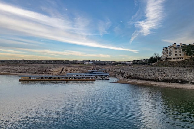 property view of water featuring a boat dock