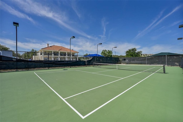 view of sport court with community basketball court and fence