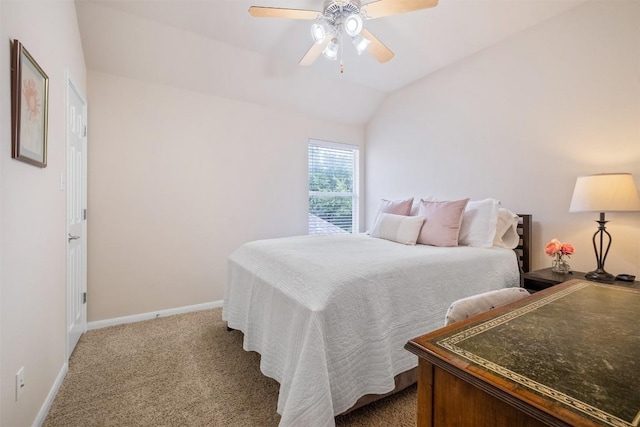 carpeted bedroom featuring lofted ceiling, ceiling fan, and baseboards