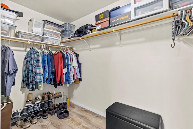 spacious closet with wood finished floors