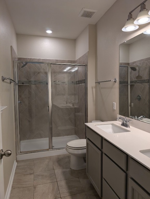 full bathroom with a stall shower, a sink, and visible vents