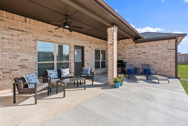 view of patio / terrace featuring an outdoor living space and a ceiling fan