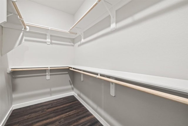 18200 Fair Ln, Jonestown, TX 78645 - walk in closet featuring dark wood-style flooring