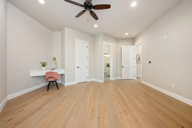 interior space with recessed lighting, light wood-style flooring, and baseboards