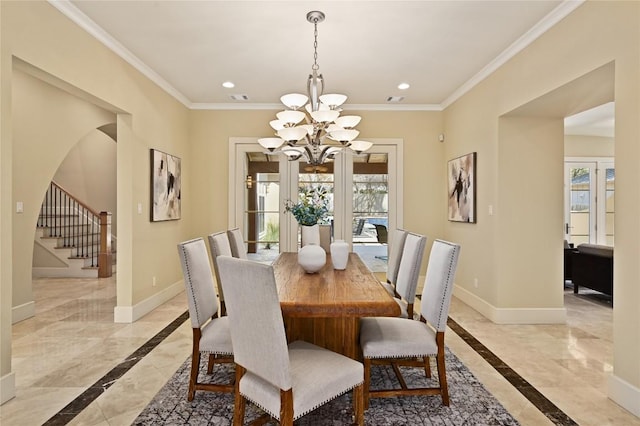 dining room with recessed lighting, crown molding, and baseboards