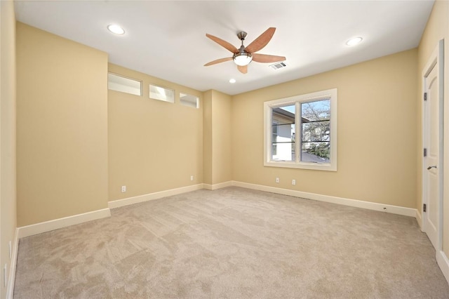 unfurnished room with a ceiling fan, carpet flooring, visible vents, and recessed lighting