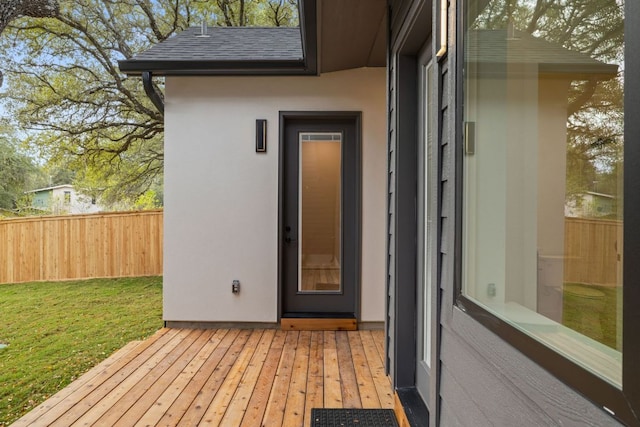 exterior space featuring fence and a yard