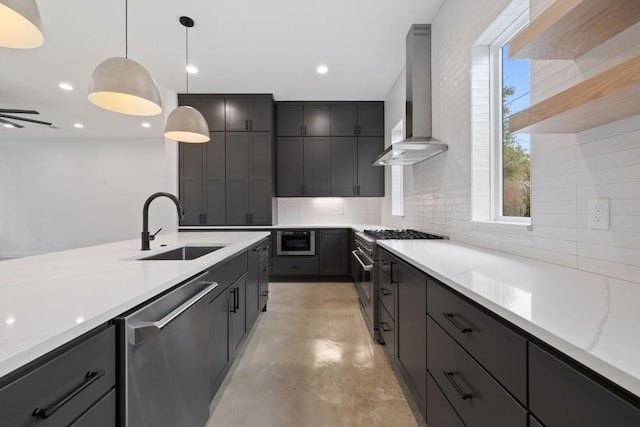 kitchen featuring stainless steel appliances, backsplash, a sink, concrete flooring, and wall chimney exhaust hood