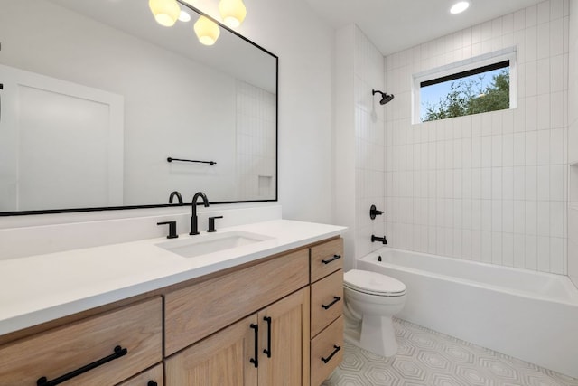 bathroom with  shower combination, tile patterned floors, toilet, and vanity