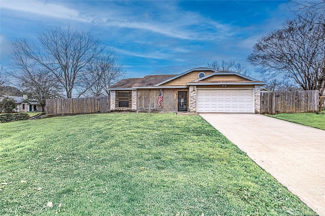 single story home with a garage, a front yard, driveway, and fence