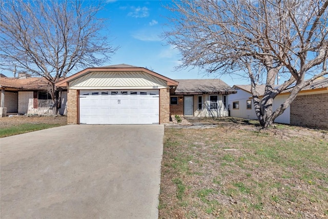 ranch-style house with a garage, driveway, brick siding, and a front lawn