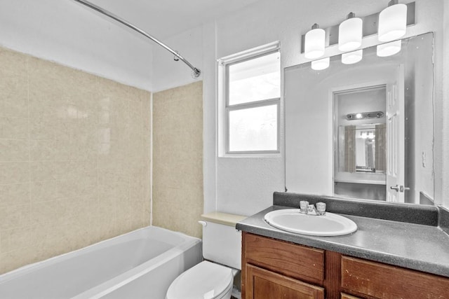 full bathroom featuring vanity, toilet, and shower / bathtub combination