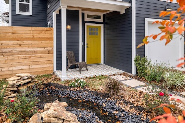 property entrance with fence