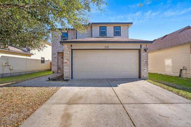2112 Perkins Pl, Georgetown, TX 78626 - traditional-style home with concrete driveway, an attached garage, and brick siding