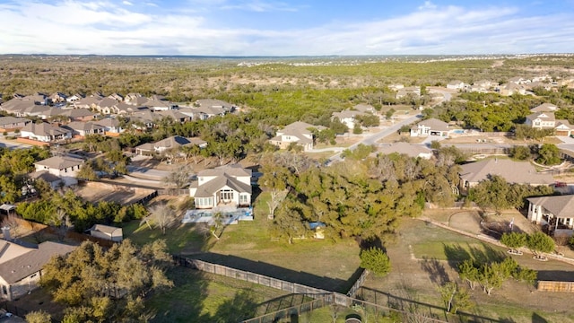 birds eye view of property with a residential view