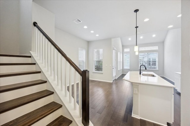 10204 Jacksboro Trl, Austin, TX 78717 - stairway with hardwood / wood-style flooring, recessed lighting, and baseboards