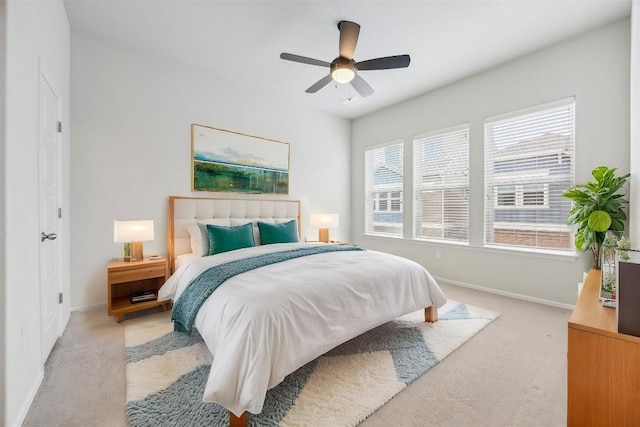 10204 Jacksboro Trl, Austin, TX 78717 - bedroom with light colored carpet, baseboards, and a ceiling fan