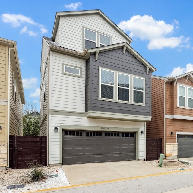 10204 Jacksboro Trl, Austin, TX 78717 - view of front of home featuring an attached garage and driveway