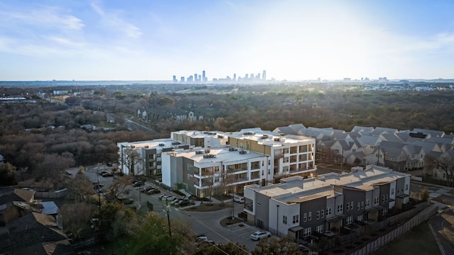 birds eye view of property featuring a city view