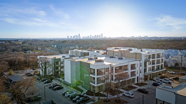 birds eye view of property featuring a city view