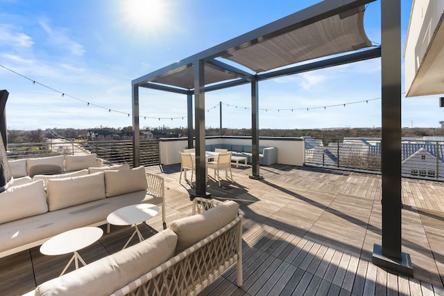 wooden deck featuring outdoor lounge area