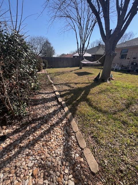 view of yard with fence