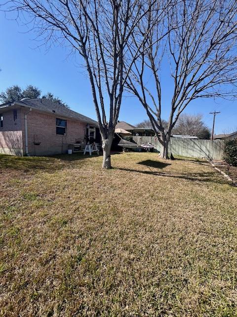 view of yard with fence